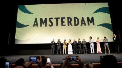 NEW YORK, NEW YORK - SEPTEMBER 18: (L-R) David O. Russell, Christian Bale, John David Washington, Margot Robbie, Robert De Niro, Rami Malek, Mike Myers, Michael Shannon, Andrea Riseborough, Timothy Olyphant, and Drake speak onstage during the World Premiere of “Amsterdam” at Lincoln Center on September 18, 2022 in New York City. (Photo by Dimitrios Kambouris/Getty Images for 20th Century Studios)