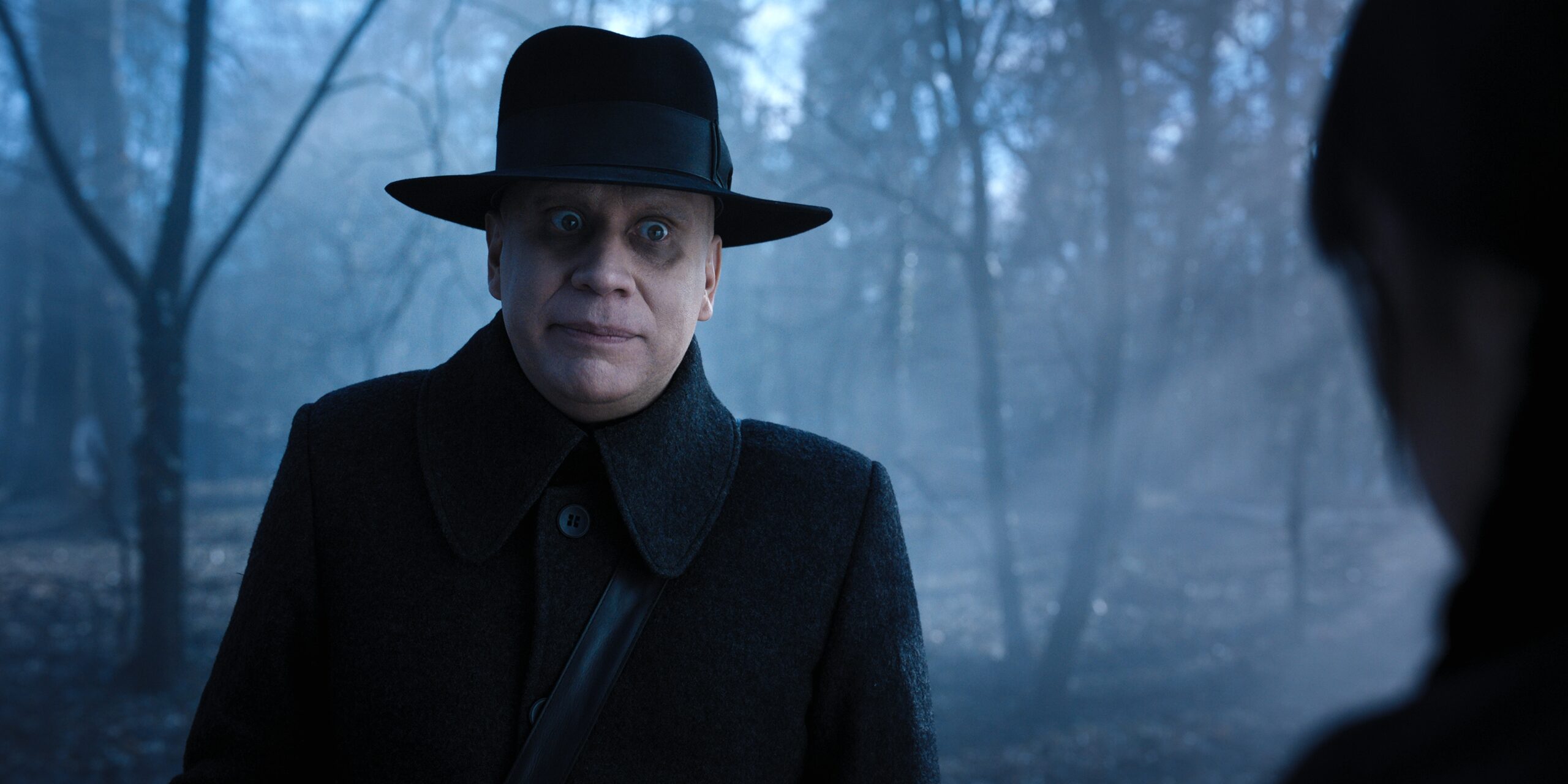 Wednesday. Fred Armisen as Uncle Fester in episode 107 of Wednesday. Cr. Vlad Cioplea/Netflix © 2022Wednesday